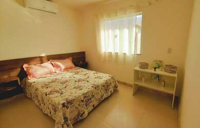 Imagem: A casa possui 4 Dormitórios, 3 Vagas na garagem e está localizado