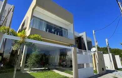 Imagem: A casa em condomínio possui 4 Dormitórios, 3 Banheiros, 5