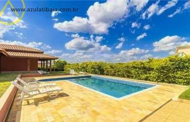 Imagem: A casa em condomínio à venda possui 3 Dormitórios, 3 Banheiros