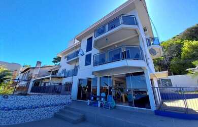 Imagem: A casa possui 3 Dormitórios, 5 Banheiros, 5 Vagas na garagem