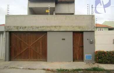 Imagem: A casa possui 4 Dormitórios, 5 Banheiros, 2 Vagas na garagem