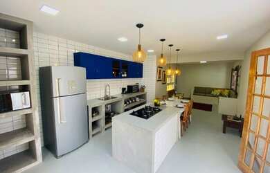 Imagem: A casa possui 5 Dormitórios, 3 Vagas na garagem e está localizado