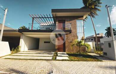 Imagem: A casa em condomínio possui 5 Dormitórios, 5 Banheiros, 2