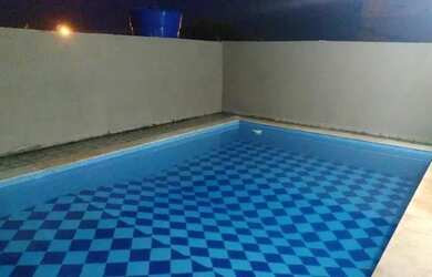 Imagem: A casa possui 3 Dormitórios, 2 Banheiros, 3 Vagas na garagem