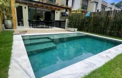 Imagem: A casa em condomínio à venda possui 4 Dormitórios, 5 Banheiros