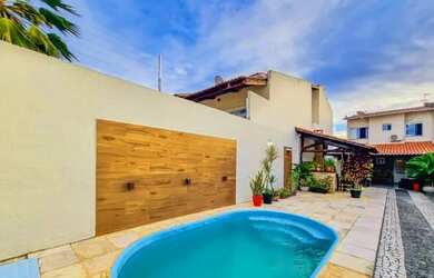 Imagem: A casa possui 3 Dormitórios, 5 Banheiros, 5 Vagas na garagem