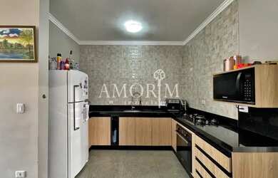 Imagem: A casa possui 2 Dormitórios, 3 Banheiros, 5 Vagas na garagem