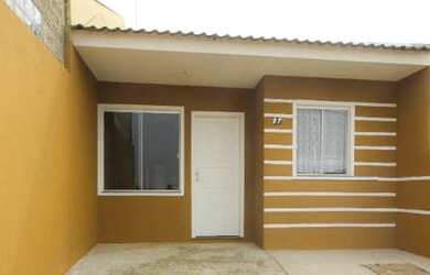 Imagem: A casa possui 3 Dormitórios, 1 Banheiro, 1 Vaga na garagem