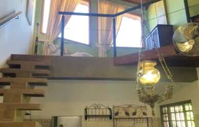 Imagem: A casa possui 3 Dormitórios, 3 Banheiros, 4 Vagas na garagem