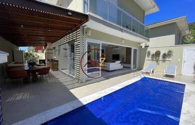 Imagem: A casa em condomínio possui 5 Dormitórios, 4 Banheiros, 3