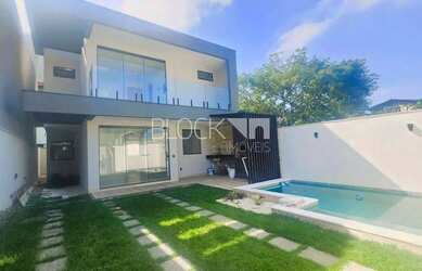 Imagem: A casa em condomínio possui 4 Dormitórios, 5 Banheiros, 2