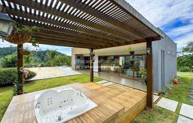 Imagem 6: Chácara com 10.000 m2 com ótima estrutura Casa principal mobiliada