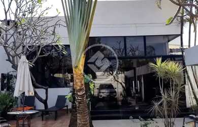 Imagem: A casa possui 2 Dormitórios, 1 Banheiro, 2 Vagas na garagem