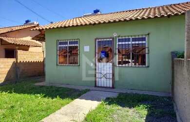 Imagem: A casa possui 2 Dormitórios, 1 Banheiro, 1 Vaga na garagem