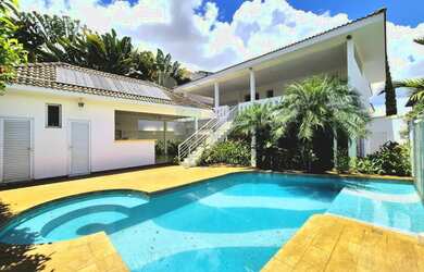 Imagem: A casa em condomínio possui 4 Dormitórios, 5 Banheiros, 4