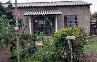 Imagem: A casa possui 3 Dormitórios, 3 Banheiros, 3 Vagas na garagem