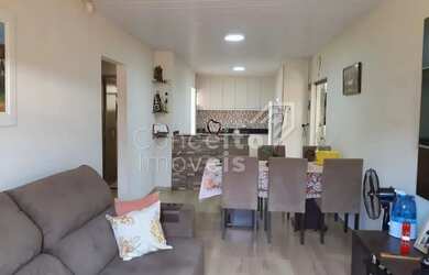 Imagem: A casa possui 3 Dormitórios, 2 Banheiros, 1 Vaga na garagem