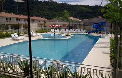 Imagem: A casa em condomínio possui 2 Dormitórios, 2 Banheiros, 1