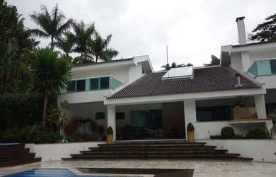 Imagem: A casa possui 5 Dormitórios, 5 Banheiros, 5 Vagas na garagem