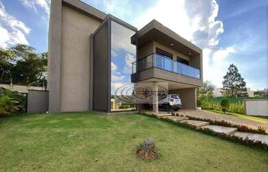 Imagem: A casa possui 4 Dormitórios, 5 Banheiros, 5 Vagas na garagem