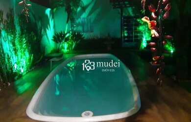 Imagem: A casa possui 3 Dormitórios, 3 Banheiros, 2 Vagas na garagem