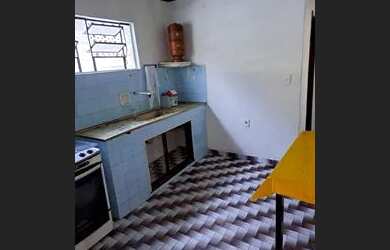 Imagem: A casa possui 2 Dormitórios, 5 Vagas na garagem e está localizado