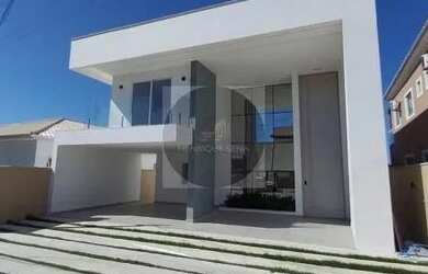 Imagem: A casa possui 3 Dormitórios, 2 Banheiros, 4 Vagas na garagem