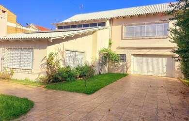 Imagem 1: Casa em Guaíba. Piscina, Churrasqueira, Área de serviçoeLareira