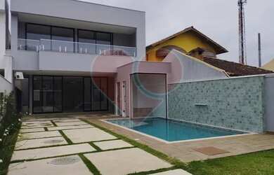 Imagem: A casa em condomínio possui 4 Dormitórios, 5 Banheiros, 2