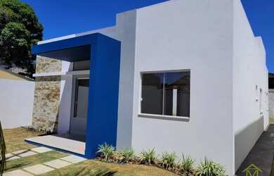 Imagem: A casa possui 3 Dormitórios, 2 Banheiros, 3 Vagas na garagem