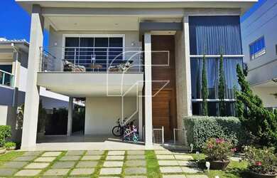 Imagem: A casa possui 4 Dormitórios, 4 Banheiros, 4 Vagas na garagem