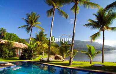 Imagem: A casa possui 5 Dormitórios, 5 Banheiros, 5 Vagas na garagem