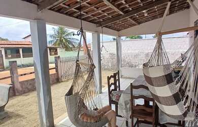 Imagem: A casa possui 2 Dormitórios, Acomodam 15 pessoas, 5 Vagas na