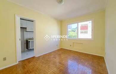 Imagem: O apartamento possui 2 Dormitórios, 1 Banheiro, 1 Vaga na garagem