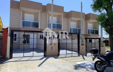 Imagem: A casa possui 2 Dormitórios, 3 Banheiros, 2 Vagas na garagem