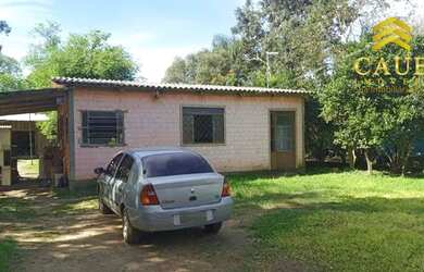 Imagem: A casa em condomínio possui 2 Dormitórios, 1 Banheiro e 653m²