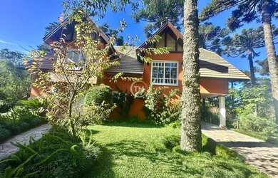 Imagem: A casa possui 3 Dormitórios, 3 Banheiros, 1 Vaga na garagem