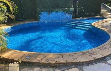 Imagem: A casa em condomínio possui 4 Dormitórios, 5 Banheiros, 2