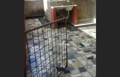 Imagem: A casa possui 3 Dormitórios, 2 Banheiros, 3 Vagas na garagem