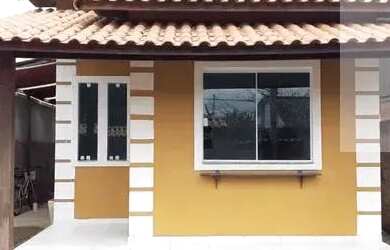 Imagem: A casa possui 2 Dormitórios, 2 Banheiros, 2 Vagas na garagem