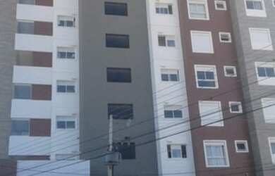 Imagem: O apartamento possui 3 Dormitórios, 1 Banheiro, 2 Vagas na