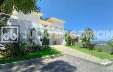 Imagem: A casa possui 5 Dormitórios, 5 Banheiros, 5 Vagas na garagem