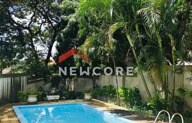 Imagem: A casa possui 4 Dormitórios, 5 Banheiros, 5 Vagas na garagem