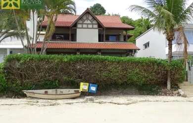 Imagem: A casa possui 4 Dormitórios, 5 Banheiros, 3 Vagas na garagem