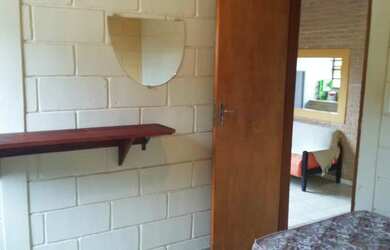 Imagem: A casa possui 2 Dormitórios, 3 Vagas na garagem e está localizado