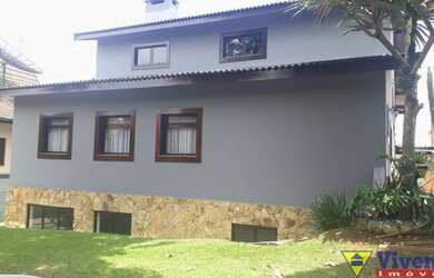 Imagem: A casa possui 4 Dormitórios, 4 Banheiros, 3 Vagas na garagem