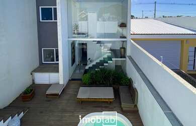 Imagem: A casa em condomínio possui 3 Dormitórios, 4 Banheiros, 2