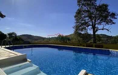 Imagem: A casa em condomínio possui 4 Dormitórios, 4 Banheiros, 5