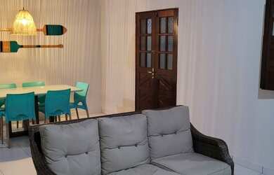 Imagem: A casa possui 2 Dormitórios e 3 Vagas na garagem e está localizado