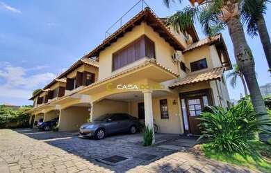 Imagem: A casa em condomínio possui 3 Dormitórios, 3 Banheiros, 2